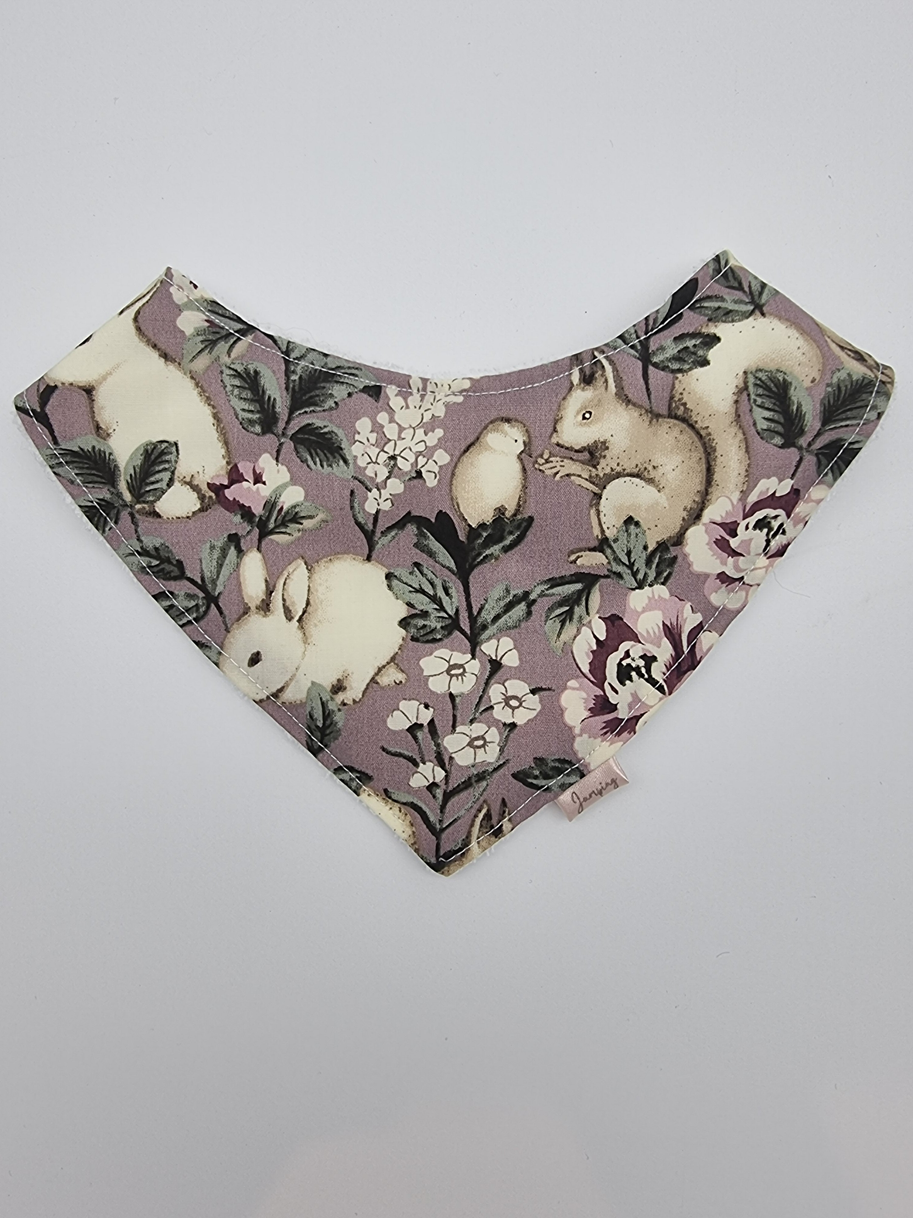 Bunnies and squirrels fitted bib